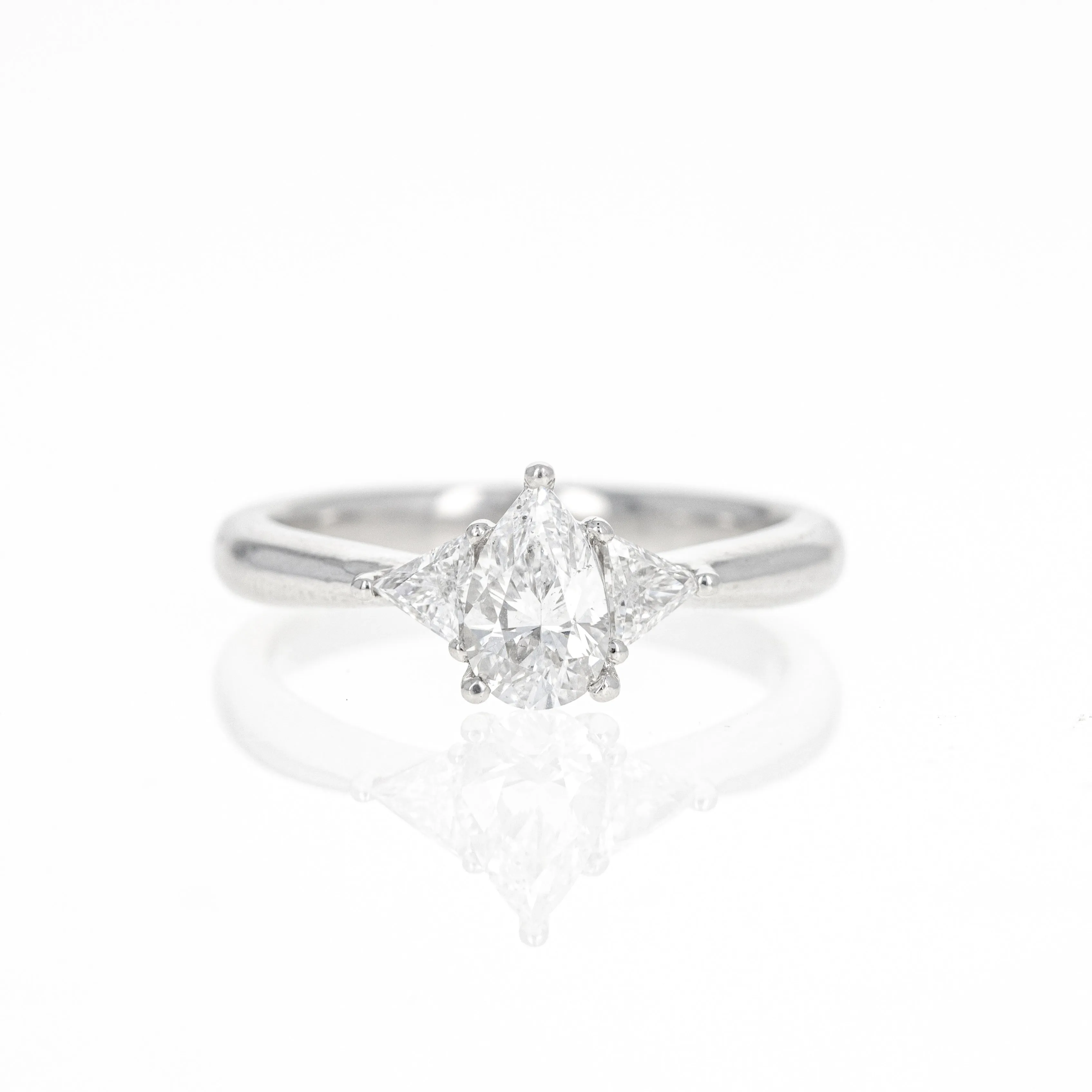 0.71 Carat Pear Diamond Trillion Three Stone Ring