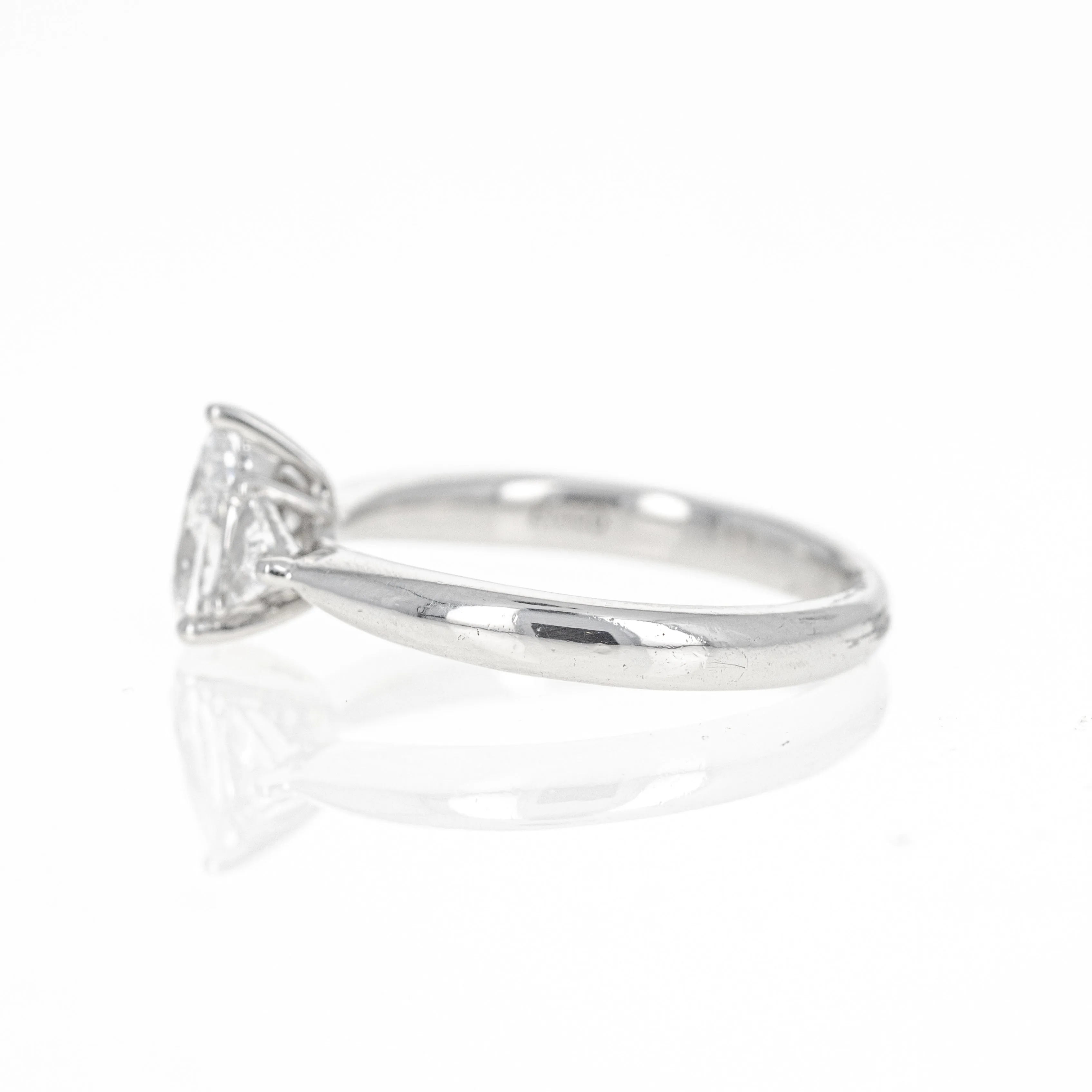 0.71 Carat Pear Diamond Trillion Three Stone Ring