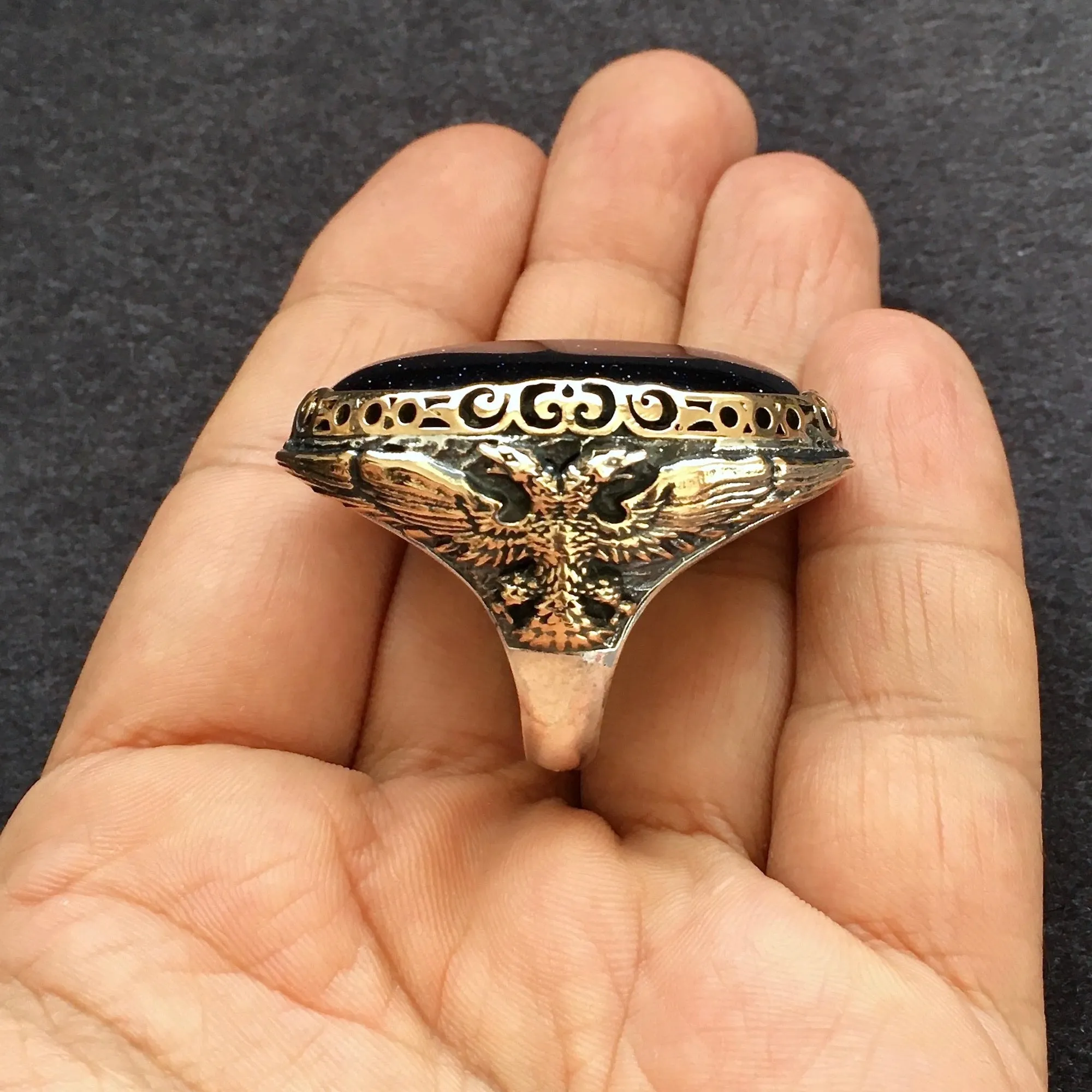 Sure! Here’s an optimized title for your e-commerce product: 

**Mens Aventurine Starstone Double-Headed Eagle Ring in 925 Sterling Silver – Bold and Unique Statement Piece**