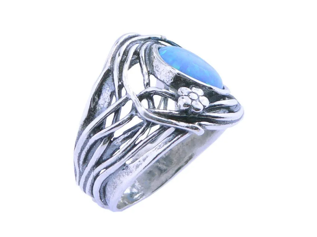 Bluenoemi sterling silver ring for woman. Israel ring. Set with a blue lab opal stone.