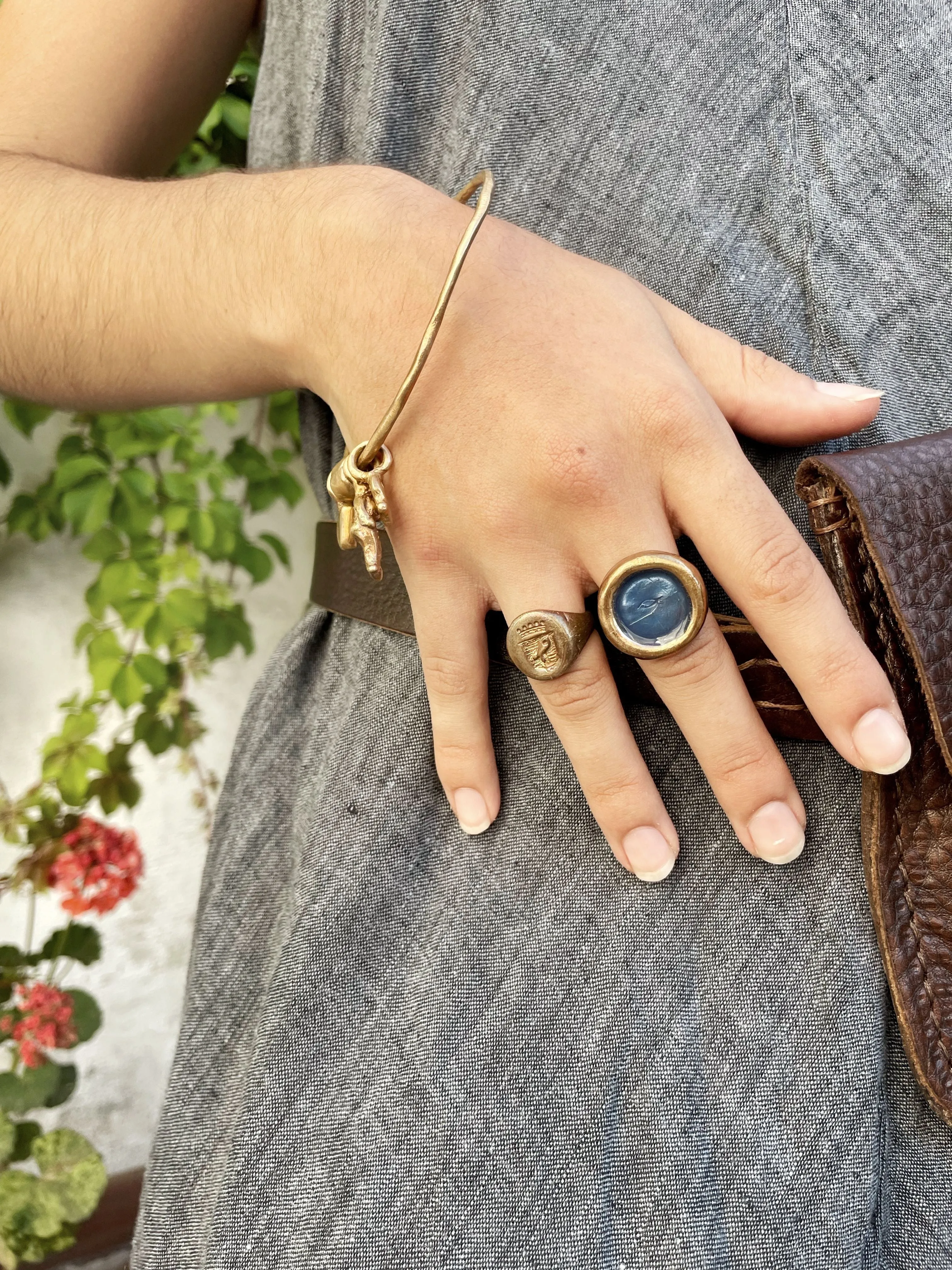 Elegant Bronze Ring Featuring Soaring Fish Design