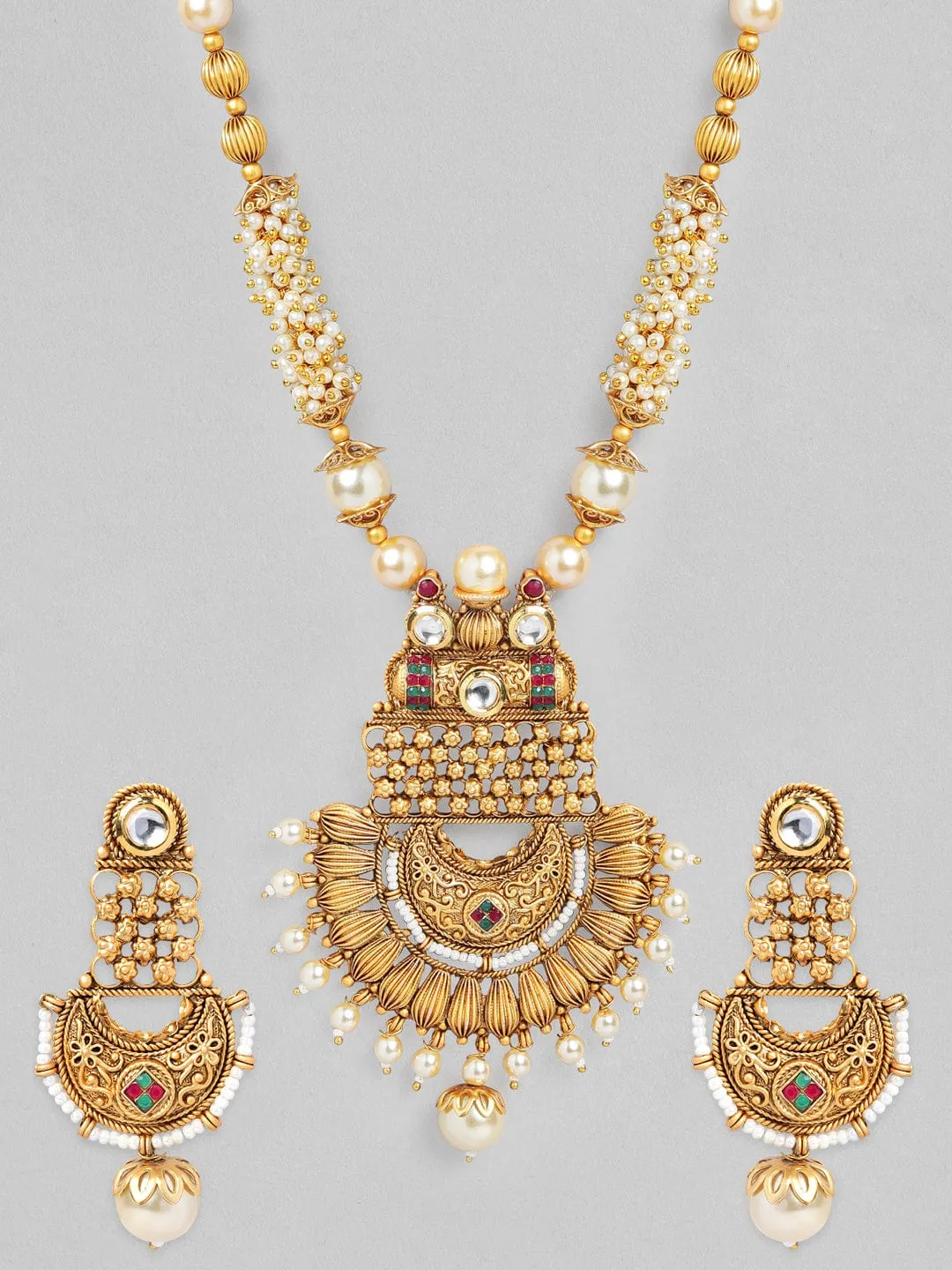 Beige Pearl Necklace Set with Heavy Gold-Plated Pendant - Elegant Jewelry Design.